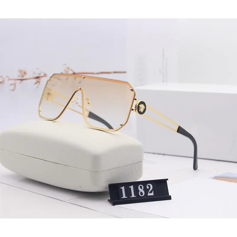 Avant-Garde Frameless Statement Sunglasses – Bold UV400 Fashion Shades with Resin Lenses (5 Color Options)