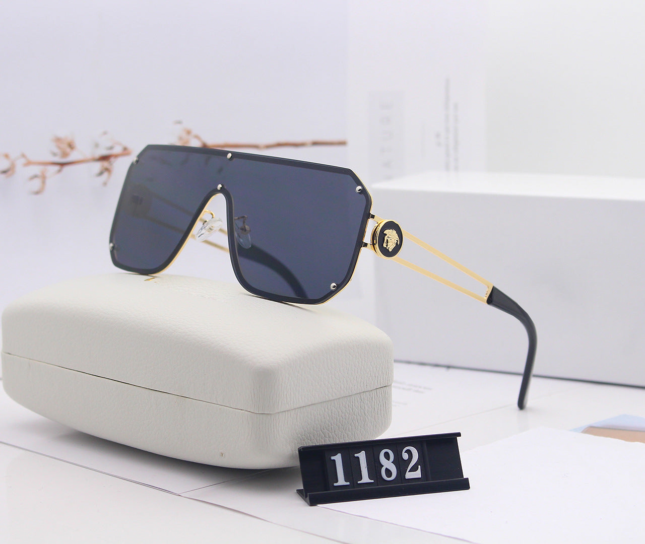 Avant-Garde Frameless Statement Sunglasses – Bold UV400 Fashion Shades with Resin Lenses (5 Color Options)
