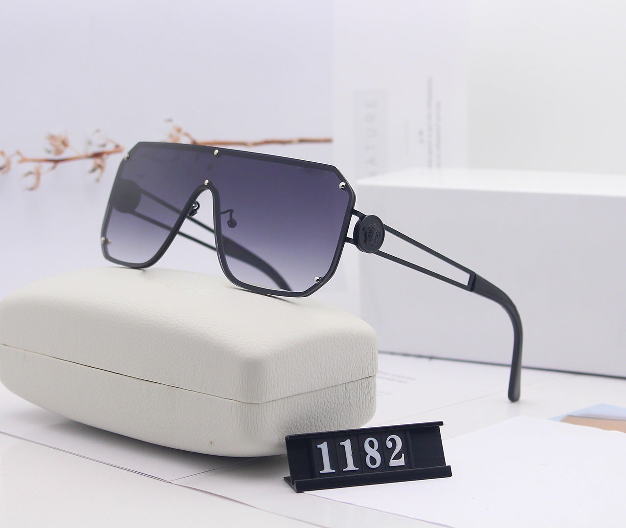 Avant-Garde Frameless Statement Sunglasses – Bold UV400 Fashion Shades with Resin Lenses (5 Color Options)