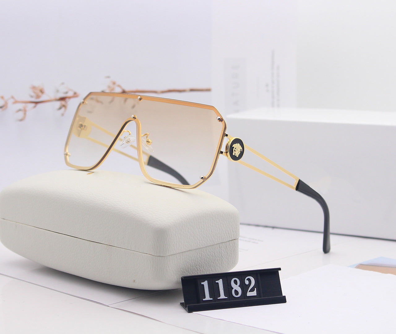 Avant-Garde Frameless Statement Sunglasses – Bold UV400 Fashion Shades with Resin Lenses (5 Color Options)