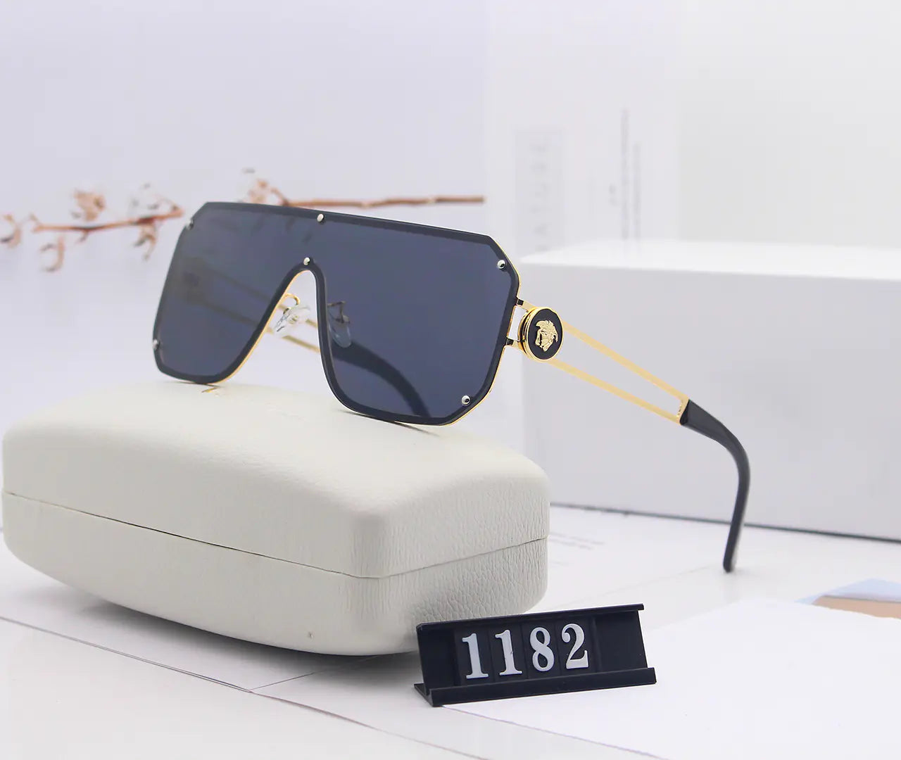 Avant-Garde Frameless Statement Sunglasses – Bold UV400 Fashion Shades with Resin Lenses (5 Color Options)