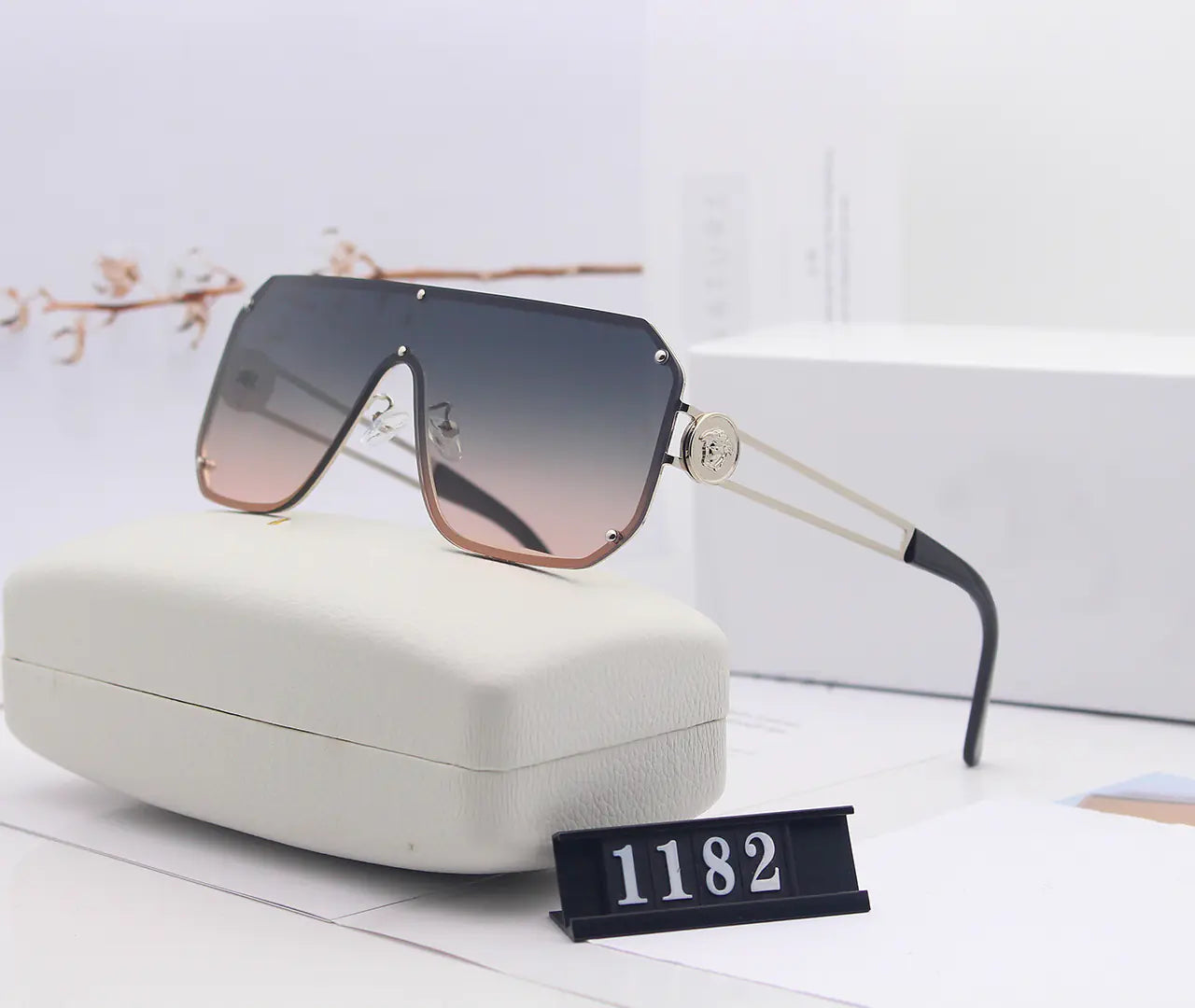 Avant-Garde Frameless Statement Sunglasses – Bold UV400 Fashion Shades with Resin Lenses (5 Color Options)
