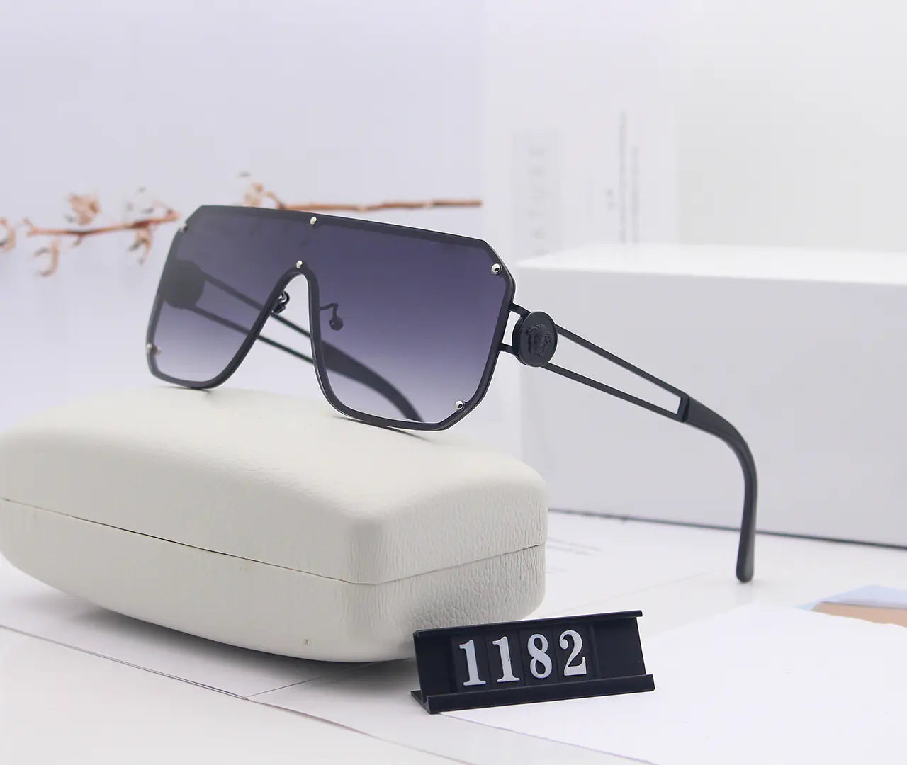 Avant-Garde Frameless Statement Sunglasses – Bold UV400 Fashion Shades with Resin Lenses (5 Color Options)