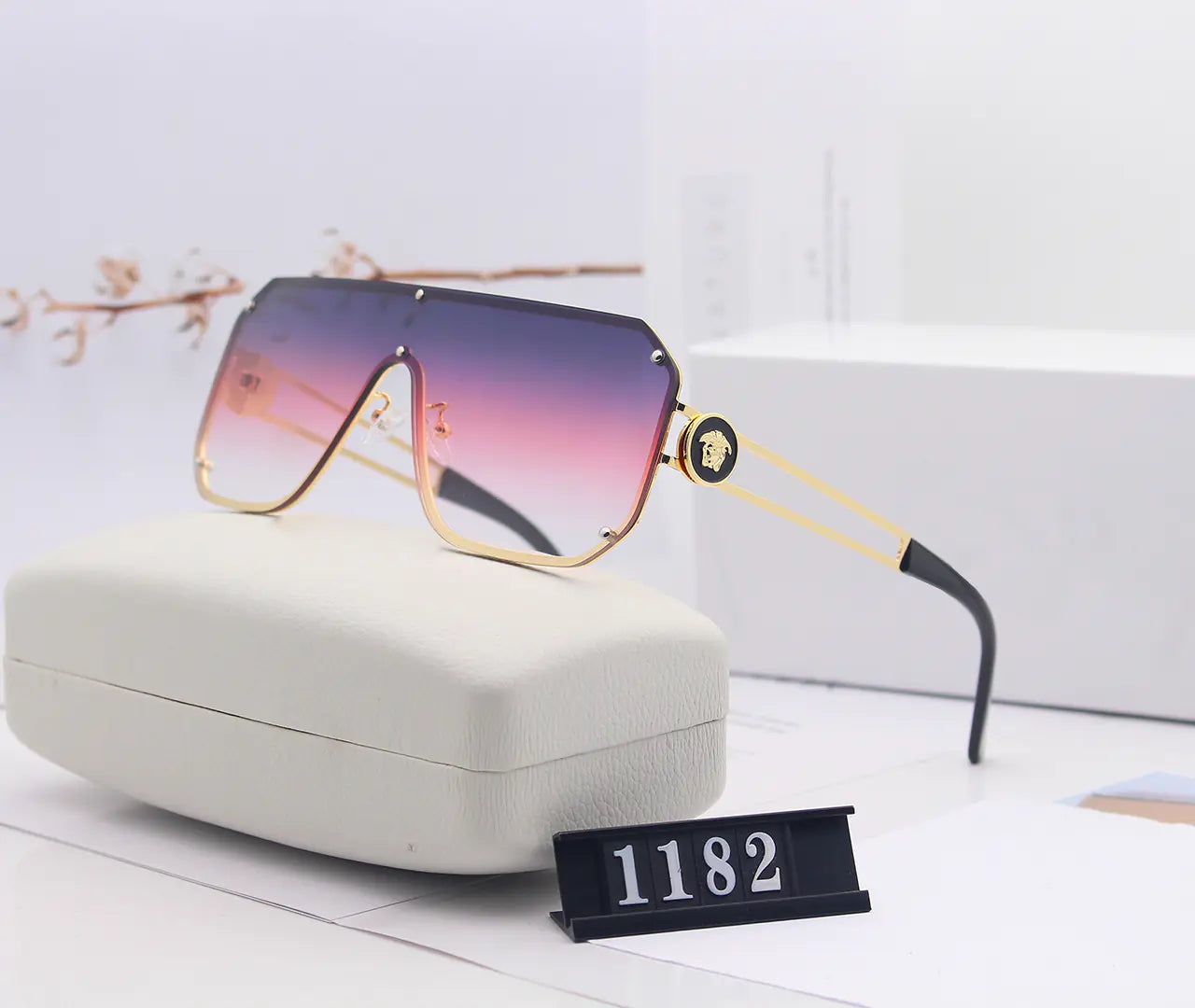 Avant-Garde Frameless Statement Sunglasses – Bold UV400 Fashion Shades with Resin Lenses (5 Color Options)