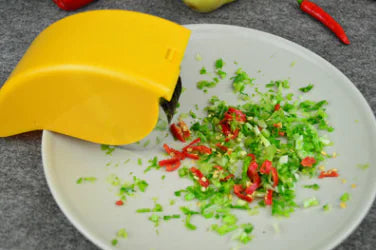 Creative Kitchen Tools – Rolling Vegetable Cutter (Stainless Steel, Green or Yellow)