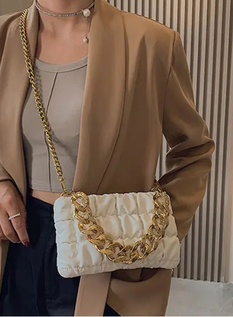 Fedora Hat and Handbag with Gold Chain – A Luxurious Fashion Statement